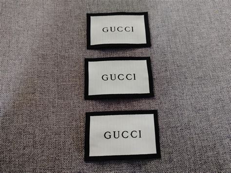 gucci size tag is on the side of label|what is gucci tag.